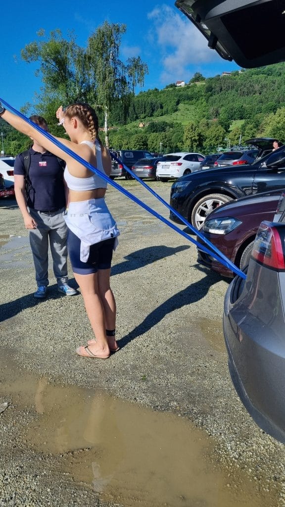 Triathlete doing pre-race warm-up routine.